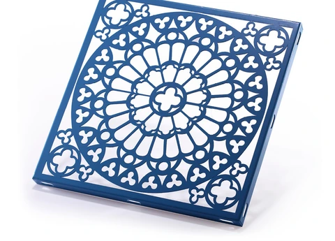 Blue decorative aluminum screen panel with a radial floral cut-out pattern