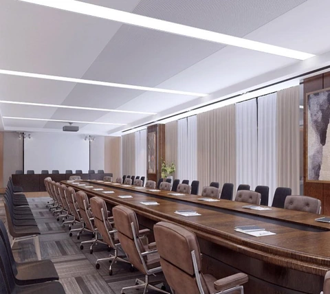 Conference room with broad ceiling panels and integrated linear lights