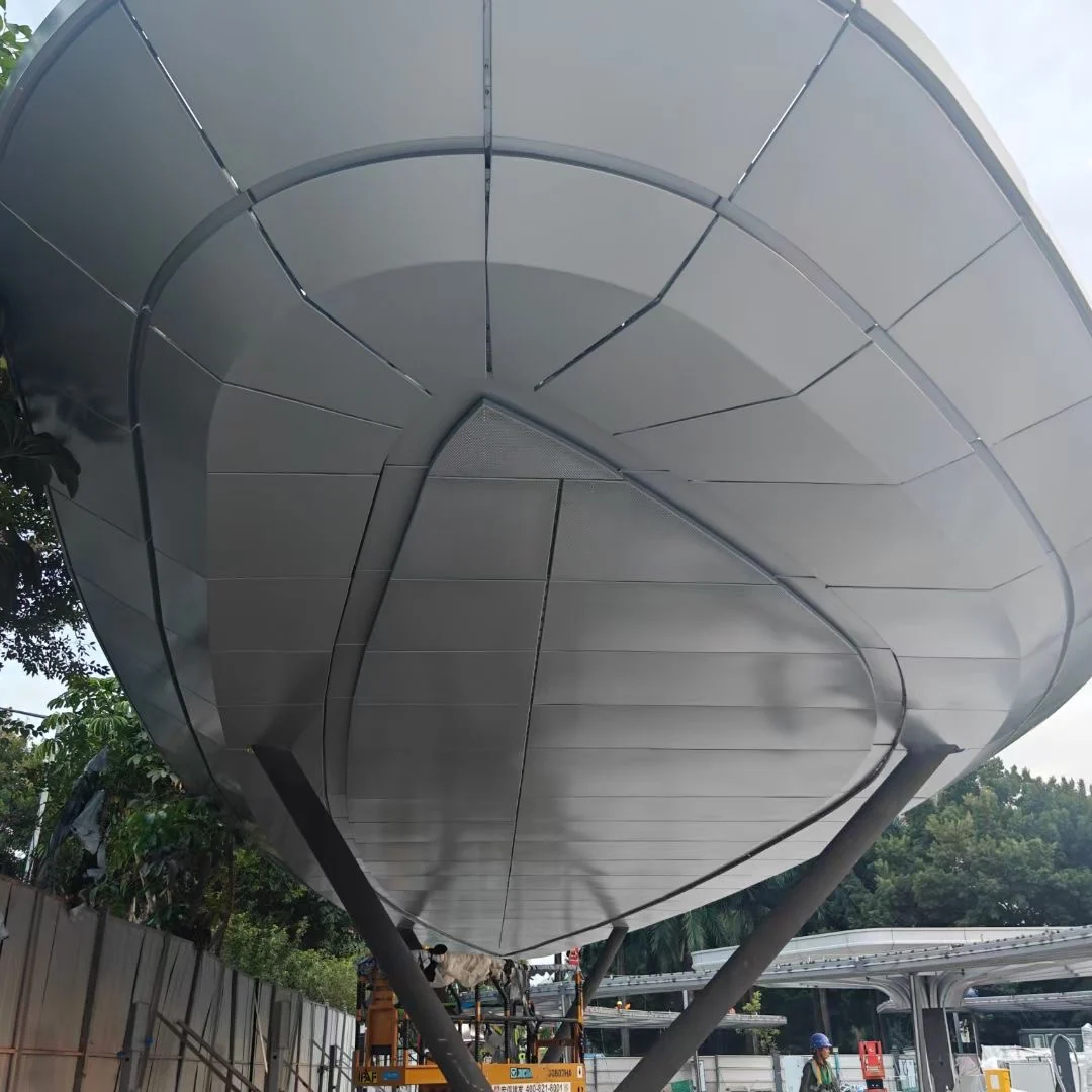 Curved canopy soffit showing panel divisions and radial joints