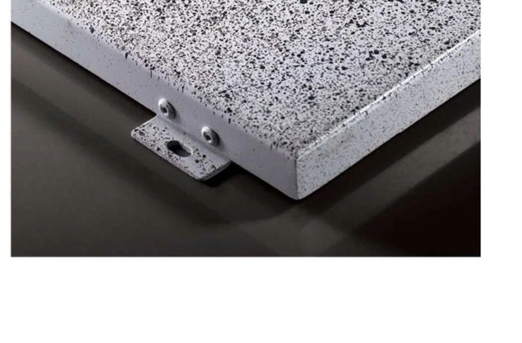Stone-effect aluminum panel corner with a speckled finish and fixing bracket