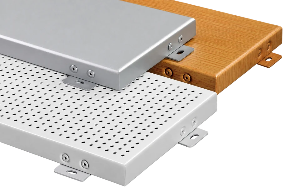Interior aluminum wall panels showing plain, wood-grain and perforated faces with edge fixings