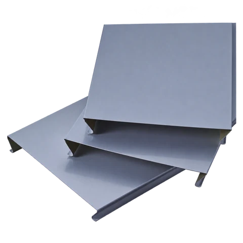S-shaped aluminum ceiling panels showing folded faces and returned edges