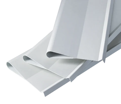 White teardrop aluminum ceiling baffle profiles showing rounded tapered cross-sections