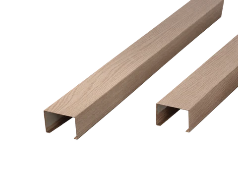 Wood-look U-shaped aluminum ceiling baffles showing open channel ends