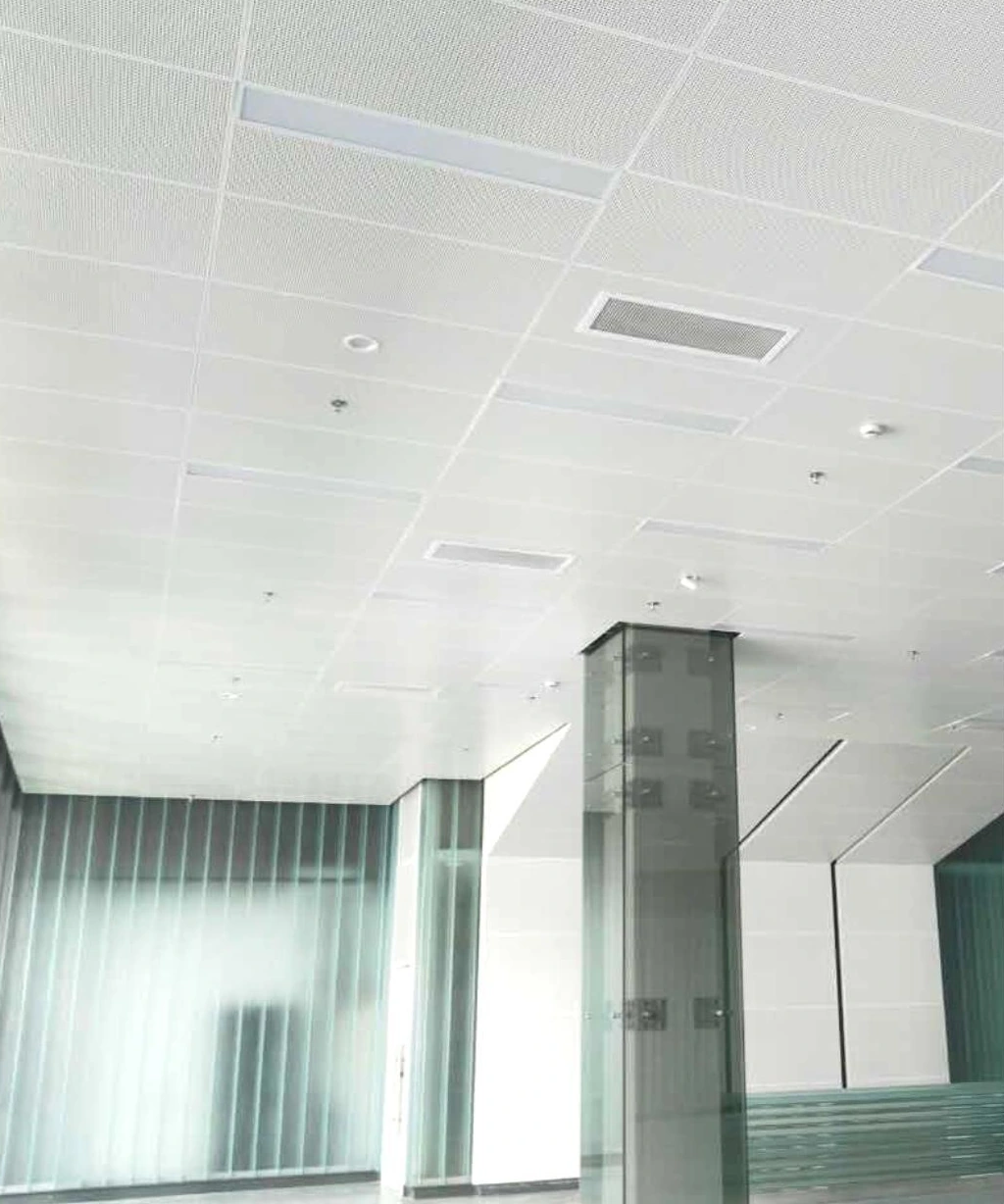 Modular perforated ceiling coordinated with rectangular air outlets and lights