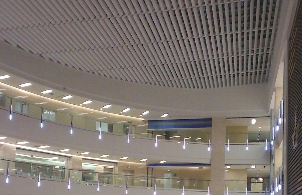 Linear metal ceiling elements above a multi-level hospital atrium in Shenyang