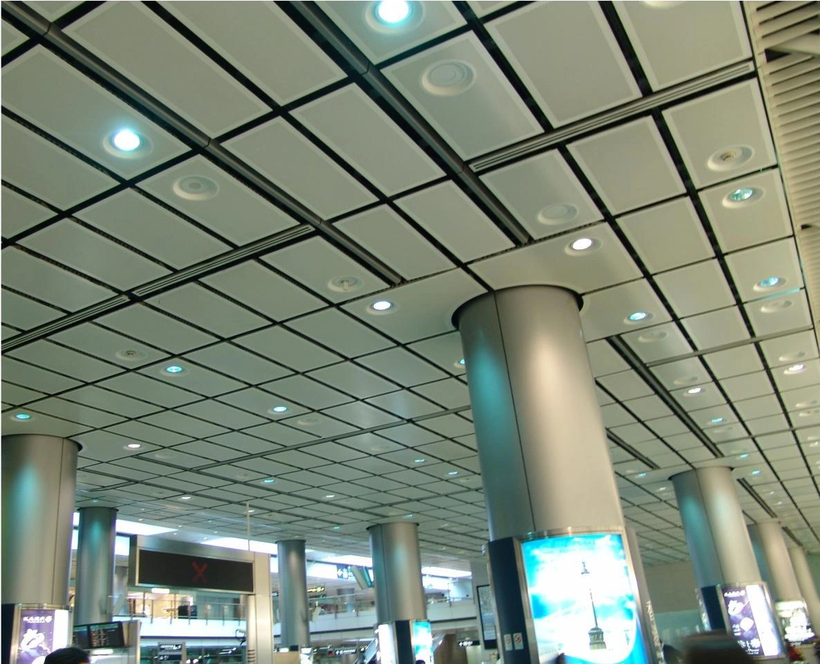 Rectangular aluminum ceiling grid with recessed circular lights at a Shanghai airport terminal