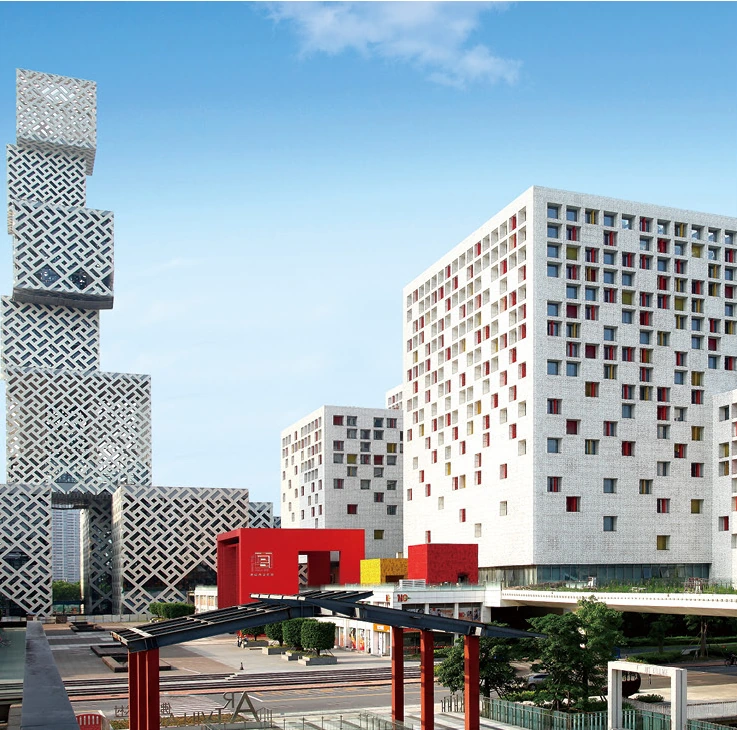 Mixed-use towers with patterned facade panels and contrasting colored window surrounds